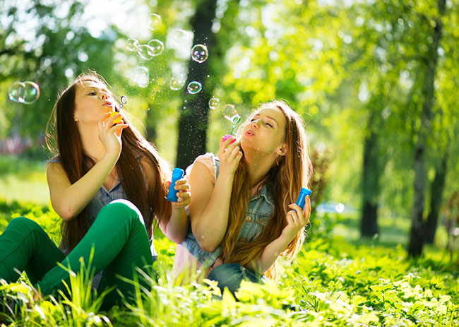 Kids And Pets - Photos On Canvas - Teenage Girls Blowing Bubbles