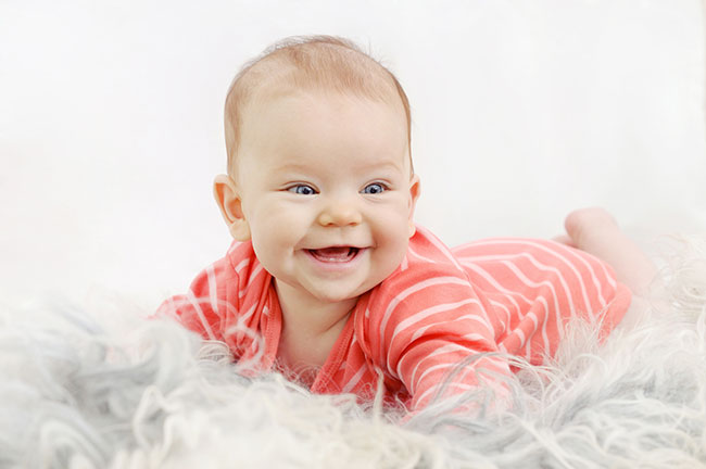 Make Babies Laugh - Photo Collage - Baby Laughing on Rug