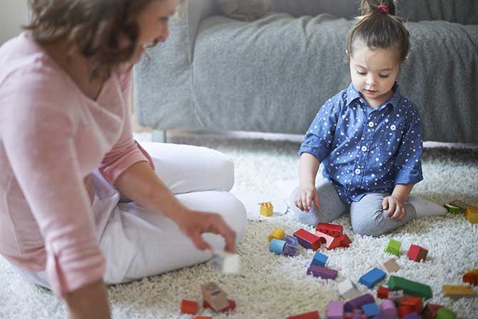 Raising Kids - Girl Playing With Blocks