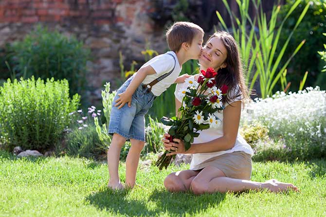 Raising Kids - Son Giving Flowers