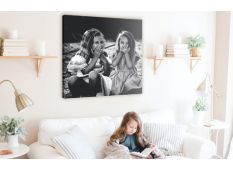 Square canvas photo print on wall with two girls in photo